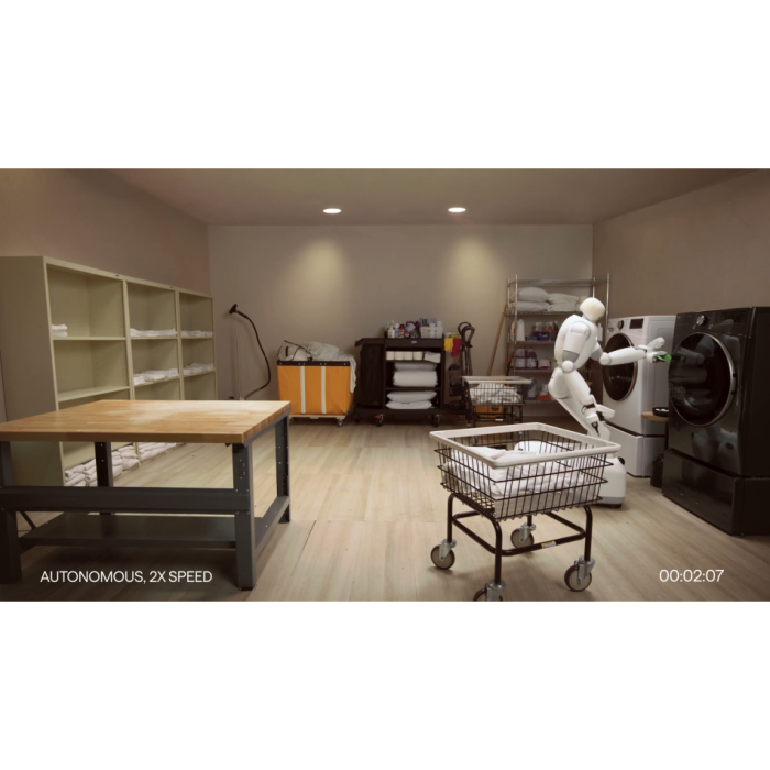 DYNA Taku Dyna-2.1 wheeled humanoid robot in a laundry workflow